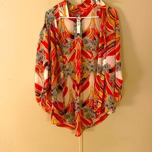 Multi color with flowers and swirls. Never worn